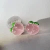 Aretes en forma de fresa y melocotón rosado