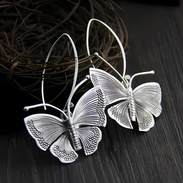 224 Arete con forma de mariposa de Color plateado Vintage